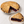 Sliced Bumbleberry Pie showing the filling, crust and a generous slice ready to serve